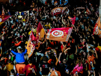 Galatasaray fans are seen celebrating the championship title of Galatasaray with flags at Taksim in Istanbul, on May 4th, 2023  (