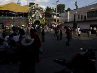 View outside the Sanctuary of the Lord of Calvary located in Culhuacan, Mexico City, as a group of people gather on the eve of the Feast of...