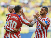 Angel Martin Correa Martinez (C) of Club Atletico de Madrid celebrates after scoring his side's first goal with his teammates Antoine Griezm...