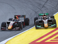Ayumu Iwasa, DAMS, and Dennis Hauger, MP Motorsport, during the Formula 2 race during the AWS Spanish Grand Prix, held at the Barcelona Cata...