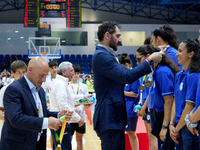 
TA' QALI, MALTA;
FIBA President Jorge Garbajosa (C), presenting the Gold medals to the Cyprus Women team members, at the Games of the Small...