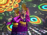 Dancers performing the art of Offering Dance, Batam, Riau Islands. The Offering Dance is a traditional Malay dance that is used to welcome g...