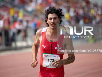 

MARSA, MALTA:
Malta's Jordan Guzman on his way to winning the Gold medal for his country in the Men's 5000m Final event from the Games of...