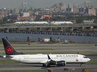 Air Canada Boeing 737-8 MAX aircraft as seen landing and taxiing at New York LaGuardia LGA international airport. The Boeing 737 MAX 8 passe...