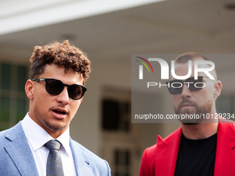 Kansas City Chiefs quarterback Patrick Mahomes (left) and tight end Travis Kelce speak to reporters following a White House celebration of t...