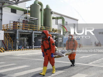 

Members of a chemical company are conducting a tank rescue drill in Huai'an City, Jiangsu Province, China, on June 12, 2023. (