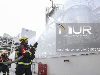 

Firefighters are performing a drill to stop a leak in a chemical pipeline in Huai'an City, East China's Jiangsu Province, on June 12, 2023...