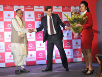 Naveen Chopra- Chief Operating Officer- Vodafone India welcome to Amit Mitra State Finance Minister at the launch of Vodafone 4G services in...