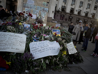Flowers outside the burnt trade union building in Odessa, Ukraine, Wednesday May 7, 2014. More than 40 people died in the riots, which some...
