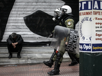 Demonstrators clash with riot police during the 24-hour general strike. Athens, February 4, 2016. Thousands of people marched across Greece...