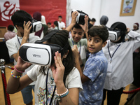 Palestinian students take part in a festival of the Science Days Palestine, at al Qattan Center in Gaza city on August 21, 2023. 
 (