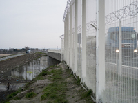 The highway which passes just above the Calais jungle, constantly monitored by the police and protected by two rows of fences, in Calais, no...