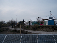 In the Calais jungle, some ecological equipment (wind, photovoltaic panel ...) are used to bring electricity, in Calais, northern France on...