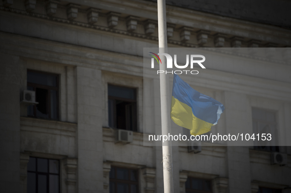 Ukraine, Odessa :  The ukrainian flag is hoist to half-mast outside the burnt trade union building in Odessa, Ukraine, May 8, 2014. More tha...