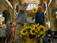 LVIV, UKRAINE - AUGUST 29, 2023 - Members of the public lay sunflowers in memory of military personnel who perished during the breakthrough...