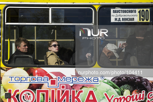 Ukraine - Odessa - Daily life - A woman looks out of a bus window, Odessa, Ukraine, Thursday, Mai 8, 2014. (Zacharie Scheurer) 