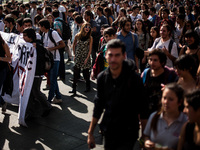 Thousands of Chilean students take out to the streets of Santiago de Chile to demand education reforms. At the end of the rally, groups of p...