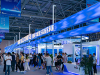  People visit the booth of the Chongqing High-tech Zone at the 2023 SMART CHINA EXPO in Chongqing, China, Sept. 5, 2023. (