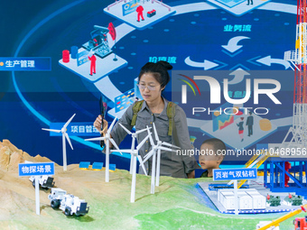  Citizens visit the CNPC booth at the 2023 SMART CHINA EXPO in Chongqing, China, Sept. 5, 2023. (