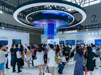  Citizens visit the booth of Chongqing Logistics Group at the 2023 SMART CHINA EXPO in Chongqing, China, Sept. 5, 2023. (