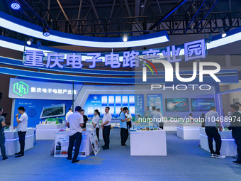  People visit the booth of Chongqing Electronic Circuit Industrial Park at the 2023 SMART CHINA EXPO in Chongqing, China, Sept. 5, 2023. (