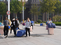DEZHOU, CHINA - SEPTEMBER 7, 2023 - Students of Dezhou University in Shandong province carry their luggage and prepare to go to the grassroo...