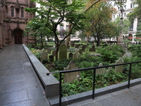 The courtyard and cemetery of the historic Trinity Church in New York, New York, Saturday, Sept. 9, 2023. (