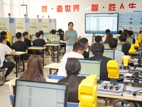 YANTAI, CHINA - SEPTEMBER 8, 2023 - Students conduct an industrial robot training at Yantai Cultural and Tourism Vocational College in Yanta...