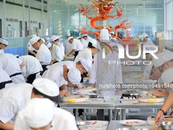 YANTAI, CHINA - SEPTEMBER 8, 2023 - Students have a cooking training at Yantai Vocational College of Culture and Tourism in East China's Sha...