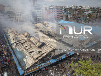 A fire broke out at Mohammadpur Krishi Market in Dhaka on September 14, 2023. A massive blaze has gutted shops in Dhaka's Mohammadpur Krishi...