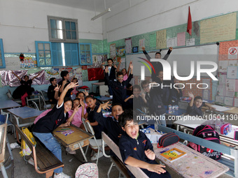 Children sit in a classroom as the 2023-2024 academic year begins for Tunisian students after the summer holiday in Tunis, Tunisia on Septem...