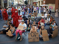 Mothers during the sit-in. Extinction Rebellion (XR) Toulouse organized a sit-in of women in one of the most frequented street of Toulouse....