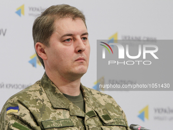 Spokesman of the Presidential Administration of Ukraine on ATO Oleksandr Motuzyanyk is seen answering the questions during press conference...