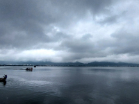 Rain clouds Hover over the Lake in Ajmer, India on 18 September 2023. (