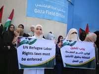 Demonstrators gather outside the Gaza Field Office for the United Nations Relief Works Agency for Palestine Refugees in the Near East (UNRWA...