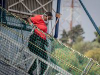 A migrant disembark from MSF's (Doctors Without Borders) Geo Barents ship at the Italian port of Brindisi on September 19, 2023. The ship ca...