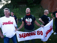 Far-right activists attend a pro-government demonstration in Krakow, Poland on September 18, 2023. Protestors organized a rally against the...