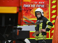 LVIV, UKRAINE - SEPTEMBER 19, 2023 - A State Emergency Service employee is seen during a response effort to the Russian drone strike at indu...