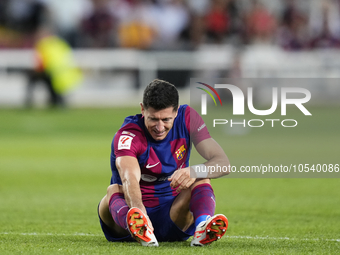 Robert Lewandowski centre-forward of Barcelona and Poland lies injured on the pitch during the LaLiga EA Sports match between FC Barcelona a...