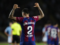 Joao Cancelo right-back of Barcelona and Portugal celebrates after scoring his sides first goal during the LaLiga EA Sports match between FC...