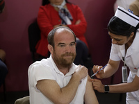 October 16, 2023, Mexico City, Mexico: The Undersecretary of Prevention and Health Promotion, Ruy Lopez Ridaura, is vaccinated against influ...