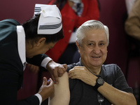 October 16, 2023, Mexico City, Mexico: Citizens are vaccinated at the start of the national vaccination campaign against influenza and Covid...