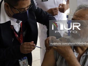 October 16, 2023, Mexico City, Mexico: Citizens are vaccinated at the start of the national vaccination campaign against influenza and Covid...