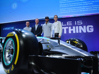 Paddy Lowe, Derek Aberle, Lewis Hamilton and Nicki Shields, posing for the press after conference,  during the second day of Mobile World Co...