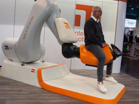 A trade fair attendee is testing the intelligent motion system at the Medica Fair 2023 in Dusseldorf, Germany, on November 13, 2023. (