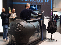 A trade fair attendee is testing an anti-gravity treadmill for pain-free physical rehabilitation training at the Medica Fair 2023 in Dusseld...
