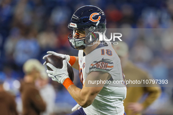 Chicago Bears tight end Robert Tonyan (18) runs the ball ahead of  an NFL  football game between the Detroit Lions and the Chicago Bears in...