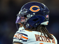 Chicago Bears defensive tackle Gervon Dexter Sr. (99) looks down the field ahead of an NFL  football game between the Detroit Lions and the...