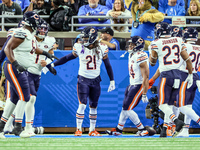 Chicago Bears running back D'Onta Foreman (21) is congratulated by teammates after making a touchdown during  an NFL  football game between...