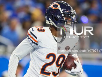 Chicago Bears cornerback Tyrique Stevenson (29) celebrates after intercepting the ball during  an NFL  football game between the Detroit Lio...